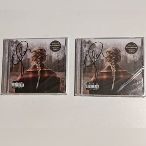 Two (2) Signed Taylor Swift Albums